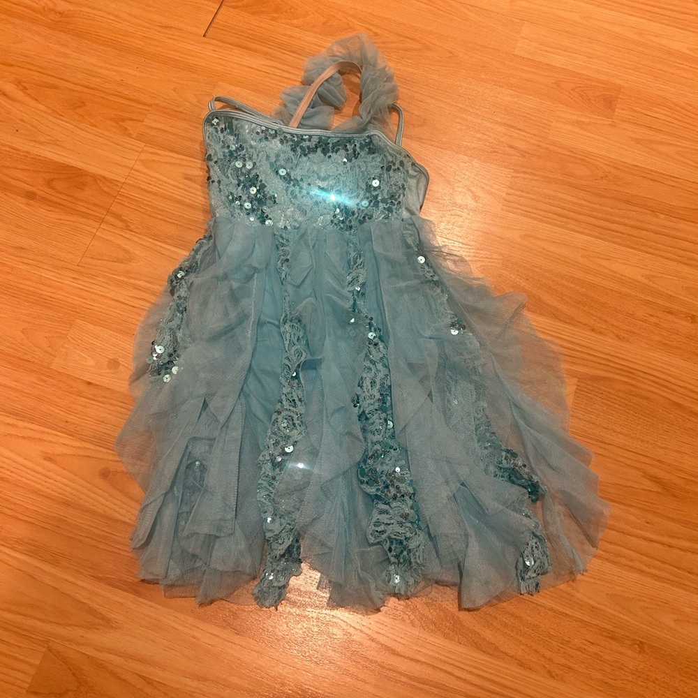 large child teal dance costume with sequins and ruffles